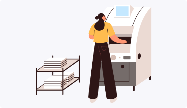 woman infront of a print machine with a colorful large printer woman infront of a print machine with a colorful large printer