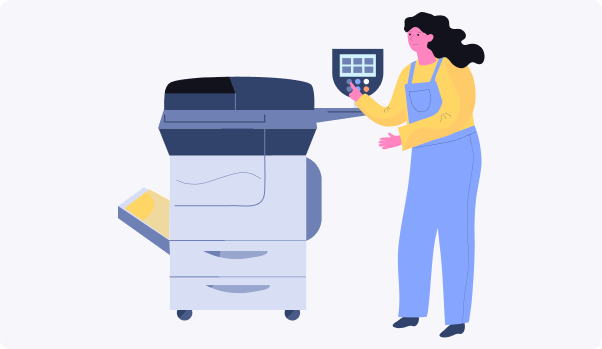 women in front of a print machine with a colorful large printer