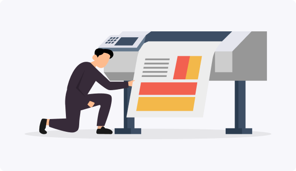 man under printing machine with a colorful large printed banner