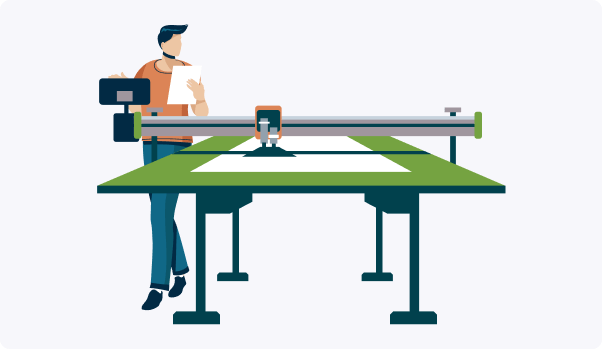 woman under print machine with a colorful large printer