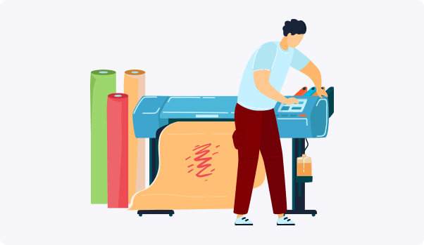 man under printing machine with a colorful large printer