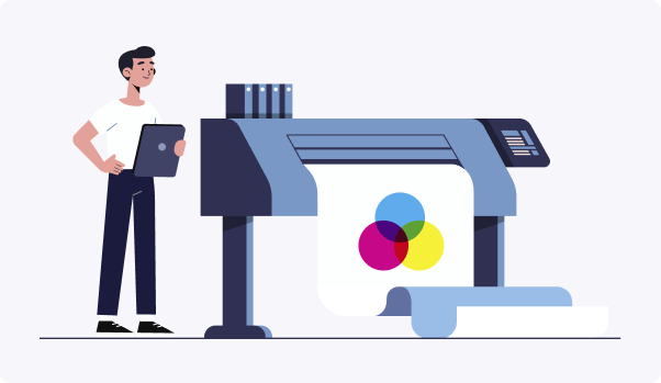 man under printing machine with a colorful large printer